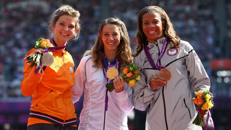 Marie-Amelie Le Fur A picture of women on a podium with medals around their neck